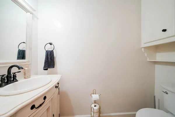 a bathroom with a sink and a toilet