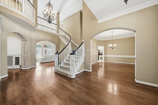 a view of entryway with wooden floor