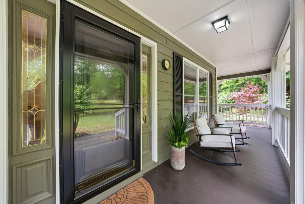 542 Knox Chapel Road Social Circle, GA 30025 - Photo 2 of 52 a living room with furniture and a window