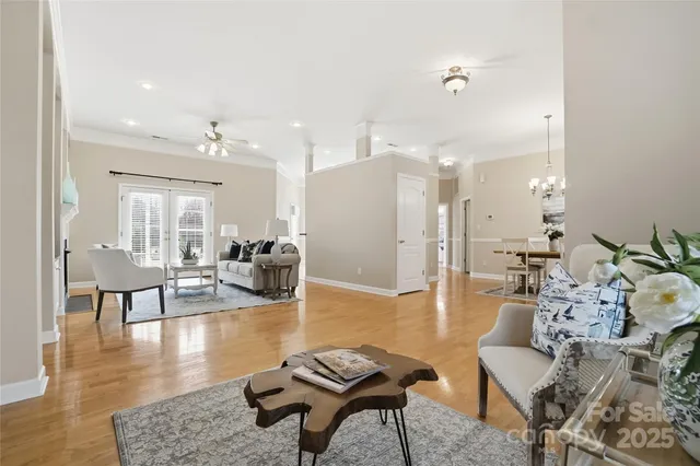 a living room with furniture and a table