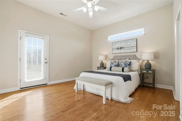 a bedroom with bed and a window