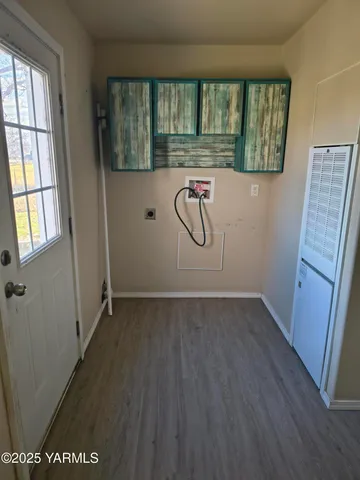 a view of a bathroom with a glass door shower