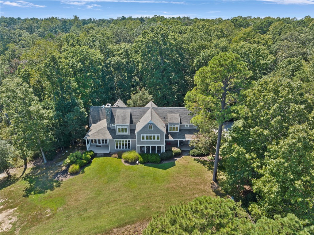1976 Custis Millpond Road West Point, VA 23181 - Photo 13 of 50 a view of a big house with a big yard and large trees