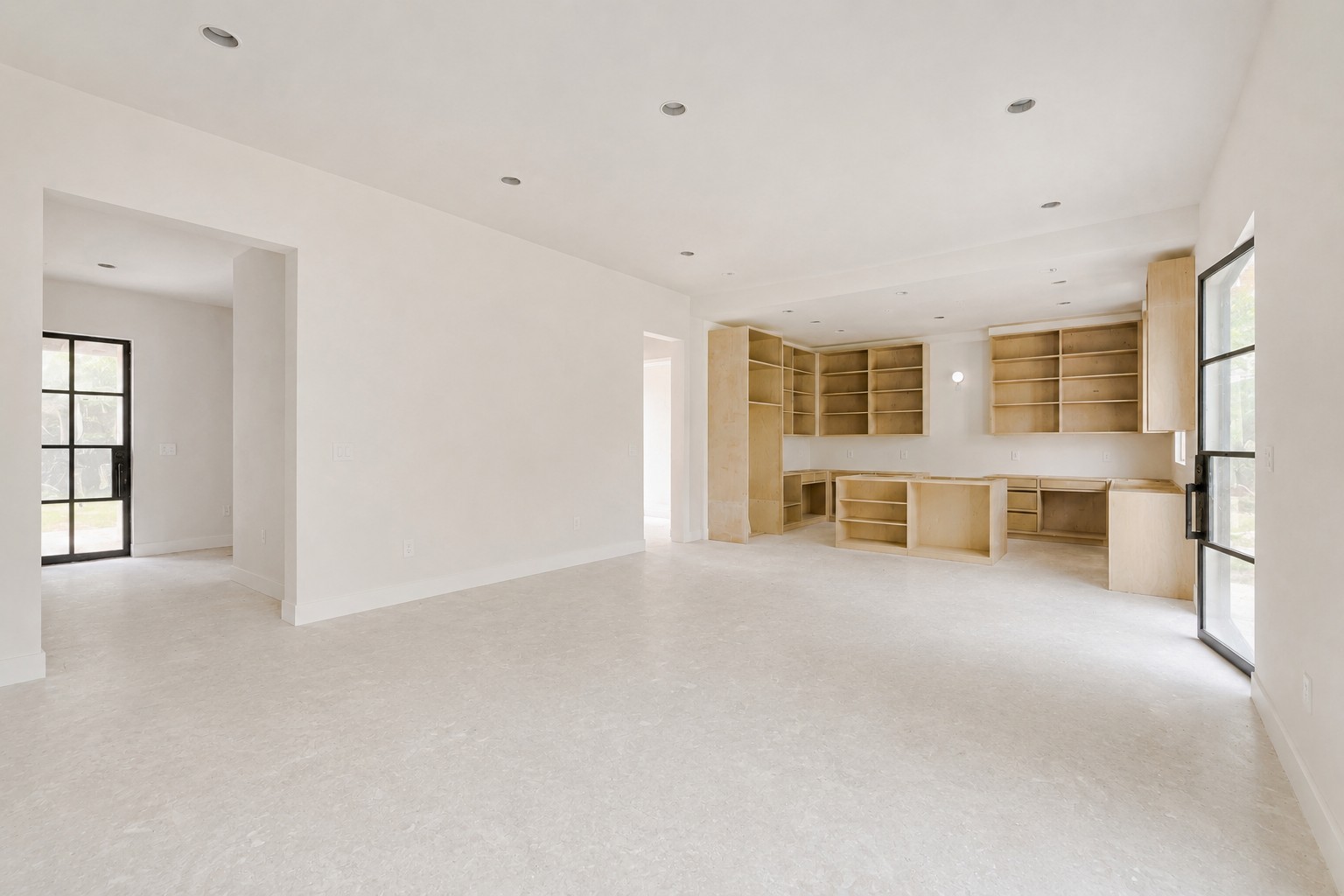 4603 Bucks Run Austin, TX 78744 - Photo 7 of 14 Spacious open-concept room featuring light-toned flooring and recessed ceiling lighting
