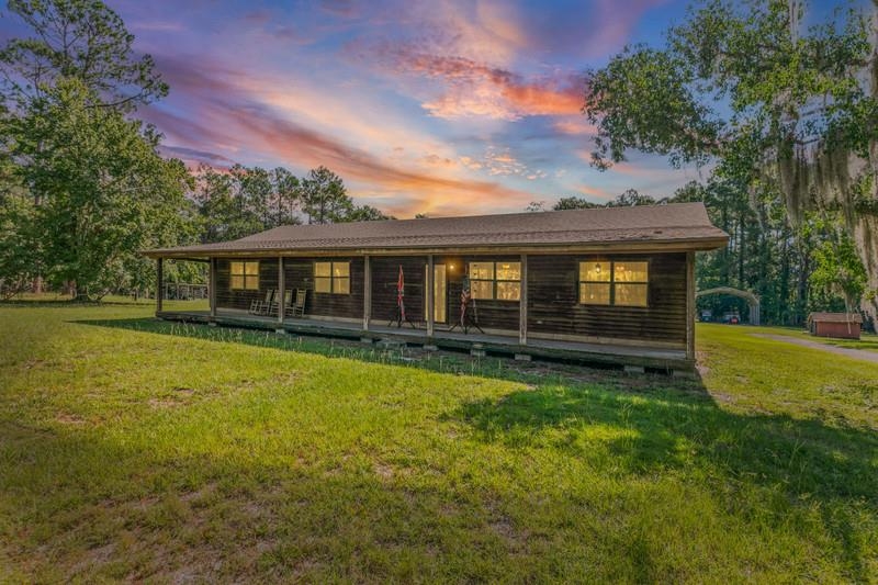 2650 Cabbage Hammock Road St. Augustine, FL 32092 - Photo 1 of 91 a view of a house with a backyard