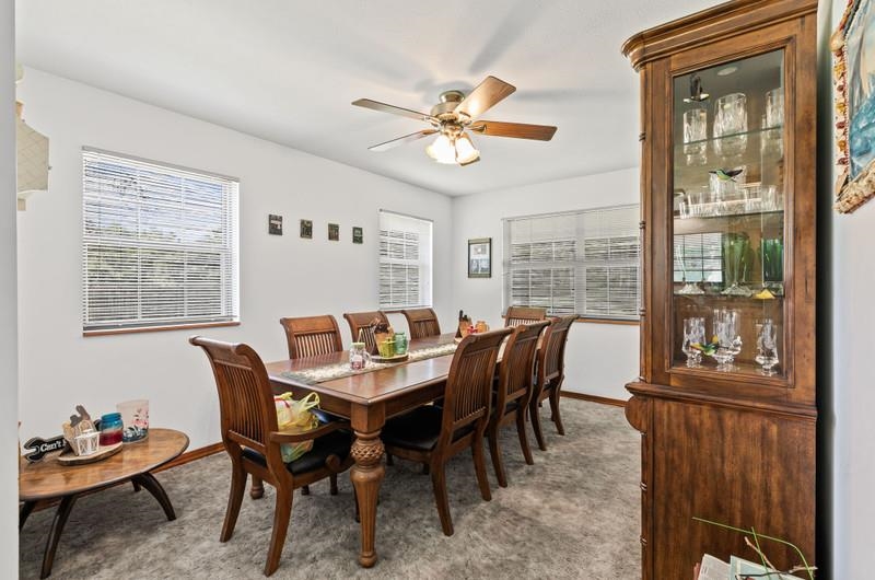 2650 Cabbage Hammock Road St. Augustine, FL 32092 - Photo 36 of 91 a view of a dining room with furniture window and outside view