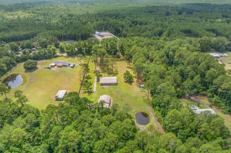 2650 Cabbage Hammock Road St. Augustine, FL 32092 - Photo 75 of 91 an aerial view of residential house with outdoor space and trees all around