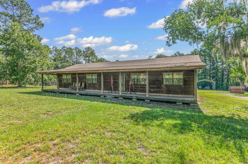 2650 Cabbage Hammock Road St. Augustine, FL 32092 - Photo 9 of 91 a view of a house with a yard