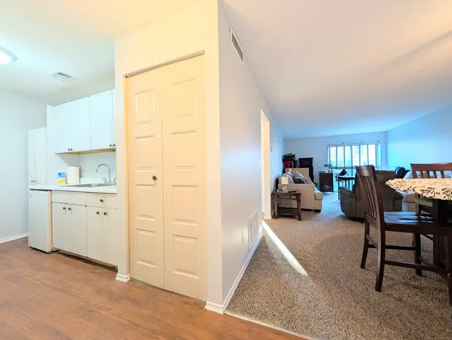 a view of a bedroom with furniture and toys