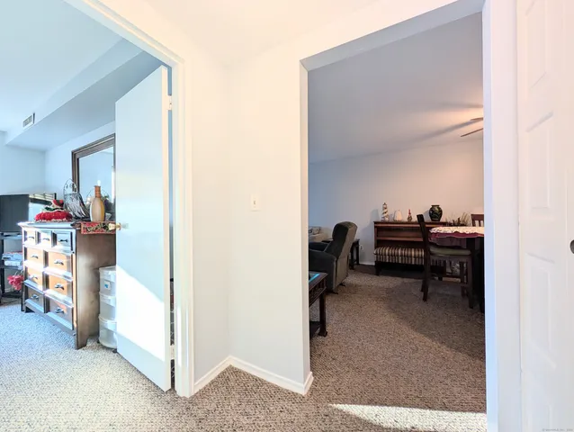 a view of a workspace with furniture