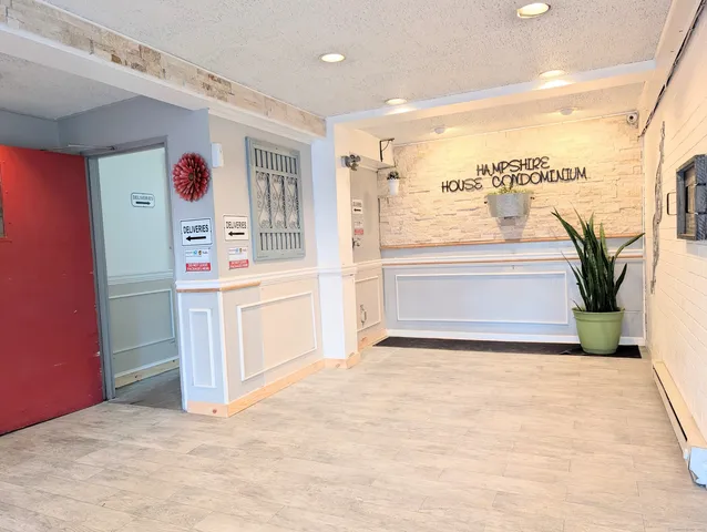 a view of kitchen with cabinets and outdoor space