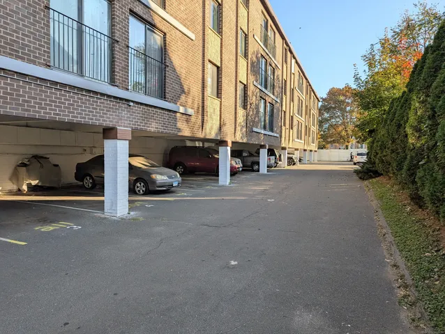 a view of a street with cars