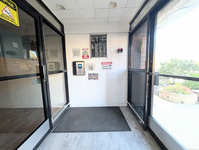 a white refrigerator freezer and a stove sitting inside of a kitchen