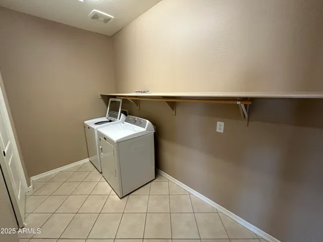 a utility room with a sink
