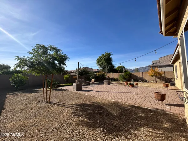 a view of a backyard of a house