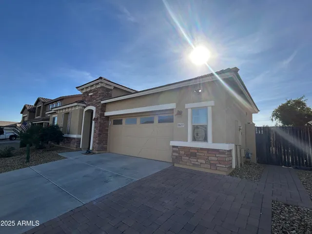 a view of a house with a garage