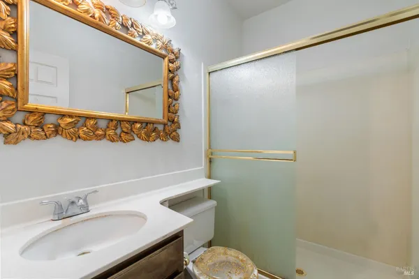 a bathroom with a sink and a shower