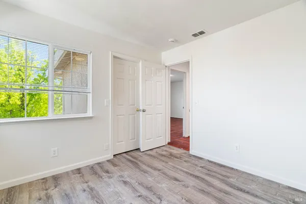 a bathroom with a sink a shower and a mirror