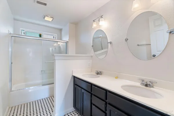 a bathroom with a shower and a toilet