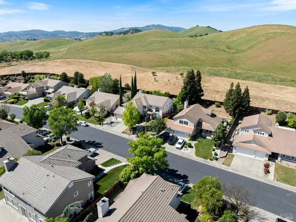 an aerial view of ocean with residential house with lake view