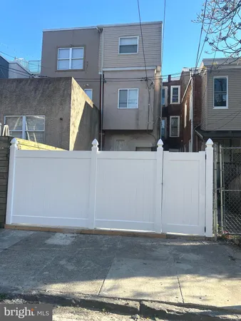 a bathroom with a sink toilet and a mirror