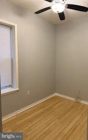 a kitchen with a sink and refrigerator