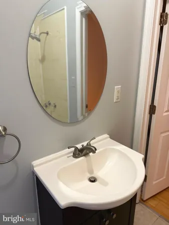 a bathroom with a sink toilet and bathtub