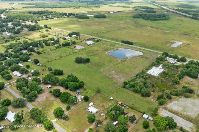 a view of a lake with a yard