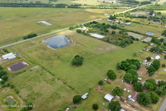 a view of a lake with a yard
