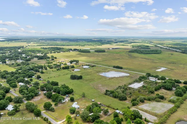 a view of a lake with a building in the background