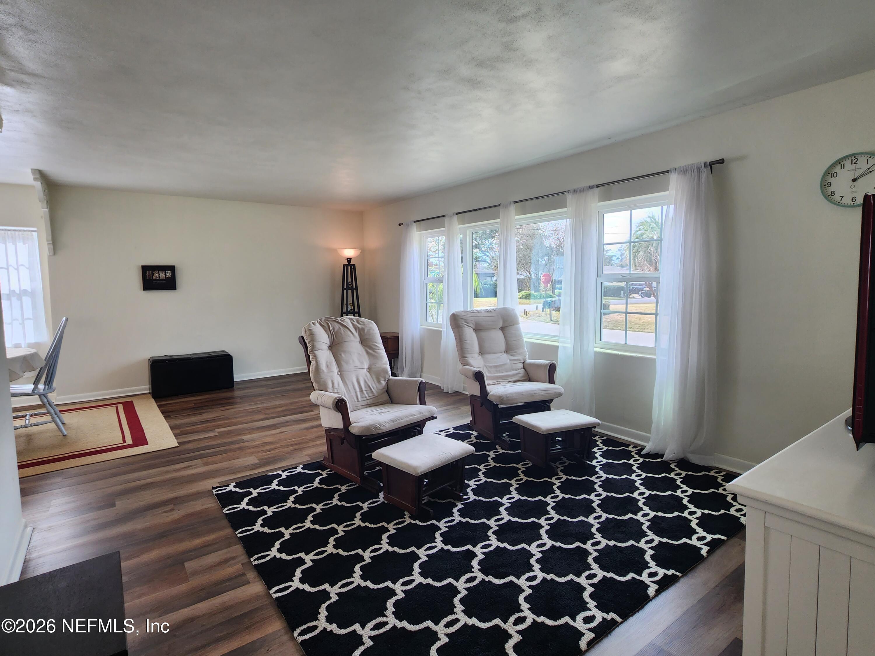 7269 Balboa Road Jacksonville, FL 32217 - Photo 12 of 24 a living room with furniture window and wooden floor