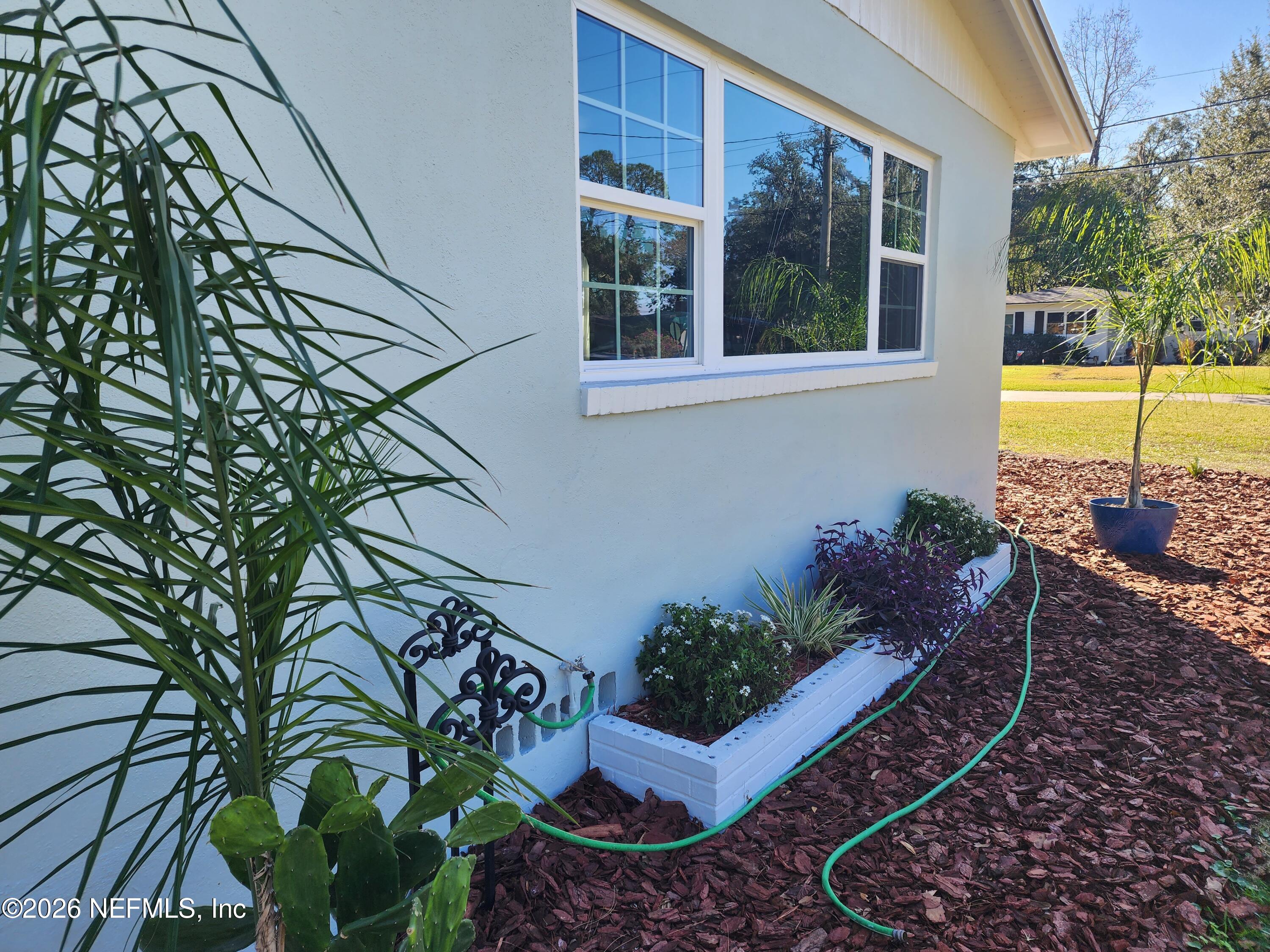 7269 Balboa Road Jacksonville, FL 32217 - Photo 23 of 24 a view of a backyard with sitting area