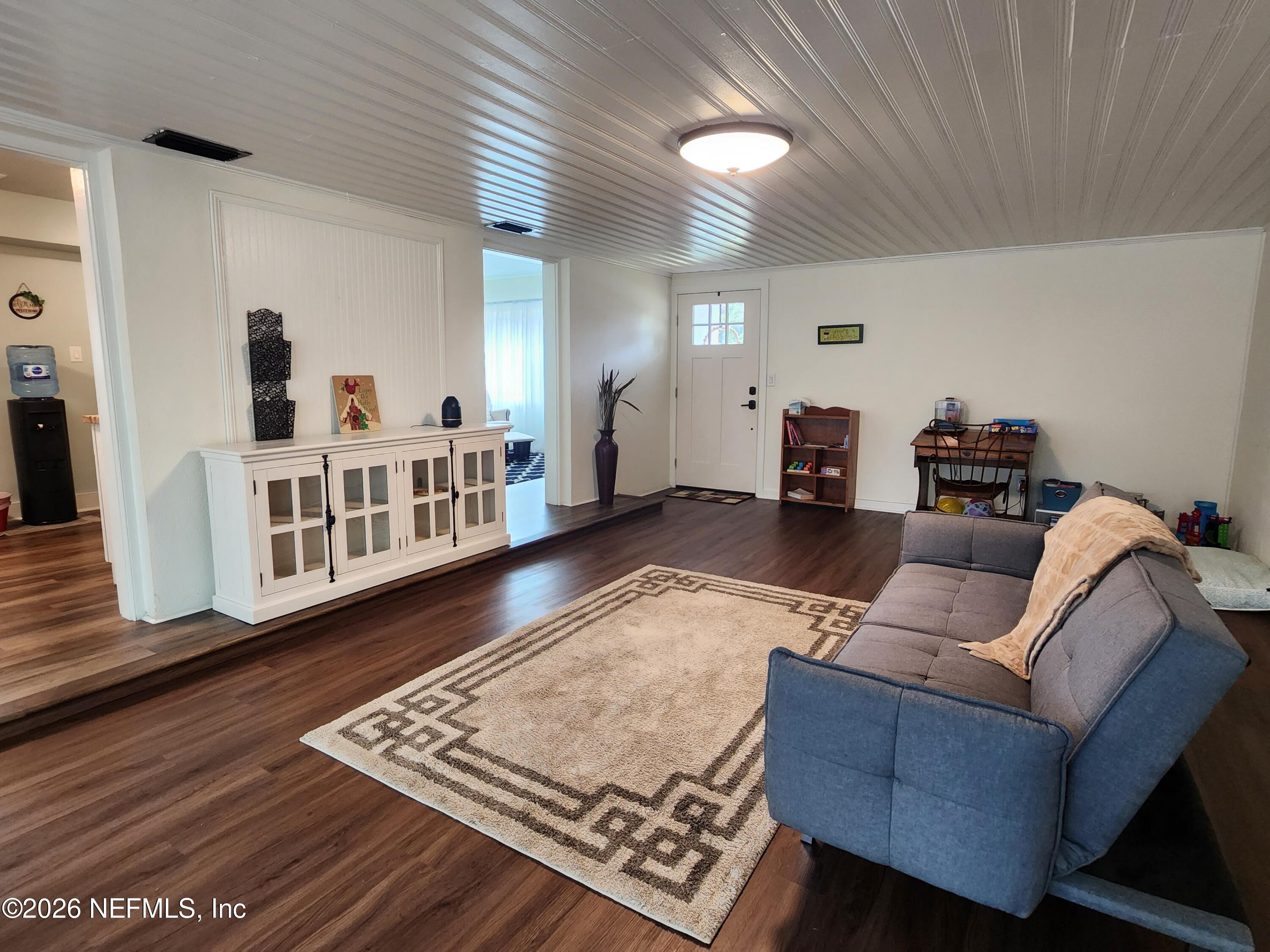 7269 Balboa Road Jacksonville, FL 32217 - Photo 4 of 24 a living room with furniture and wooden floor