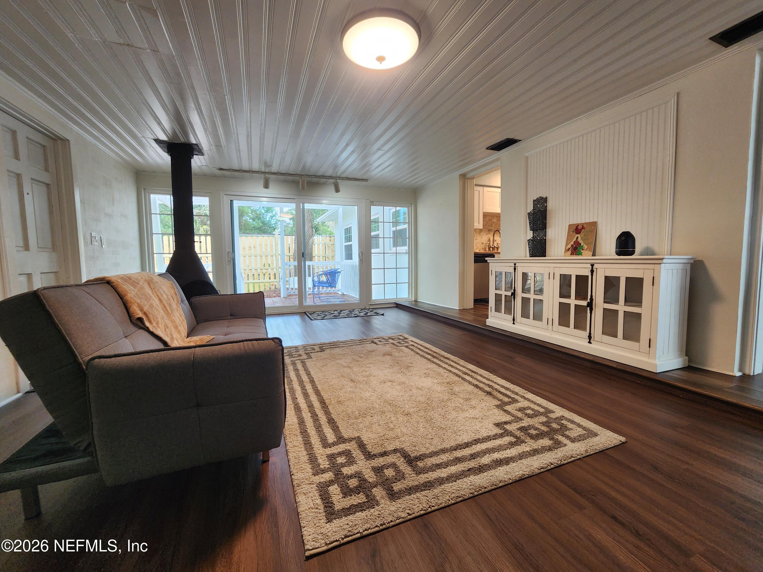 7269 Balboa Road Jacksonville, FL 32217 - Photo 5 of 24 a living room with furniture rug and wooden floor