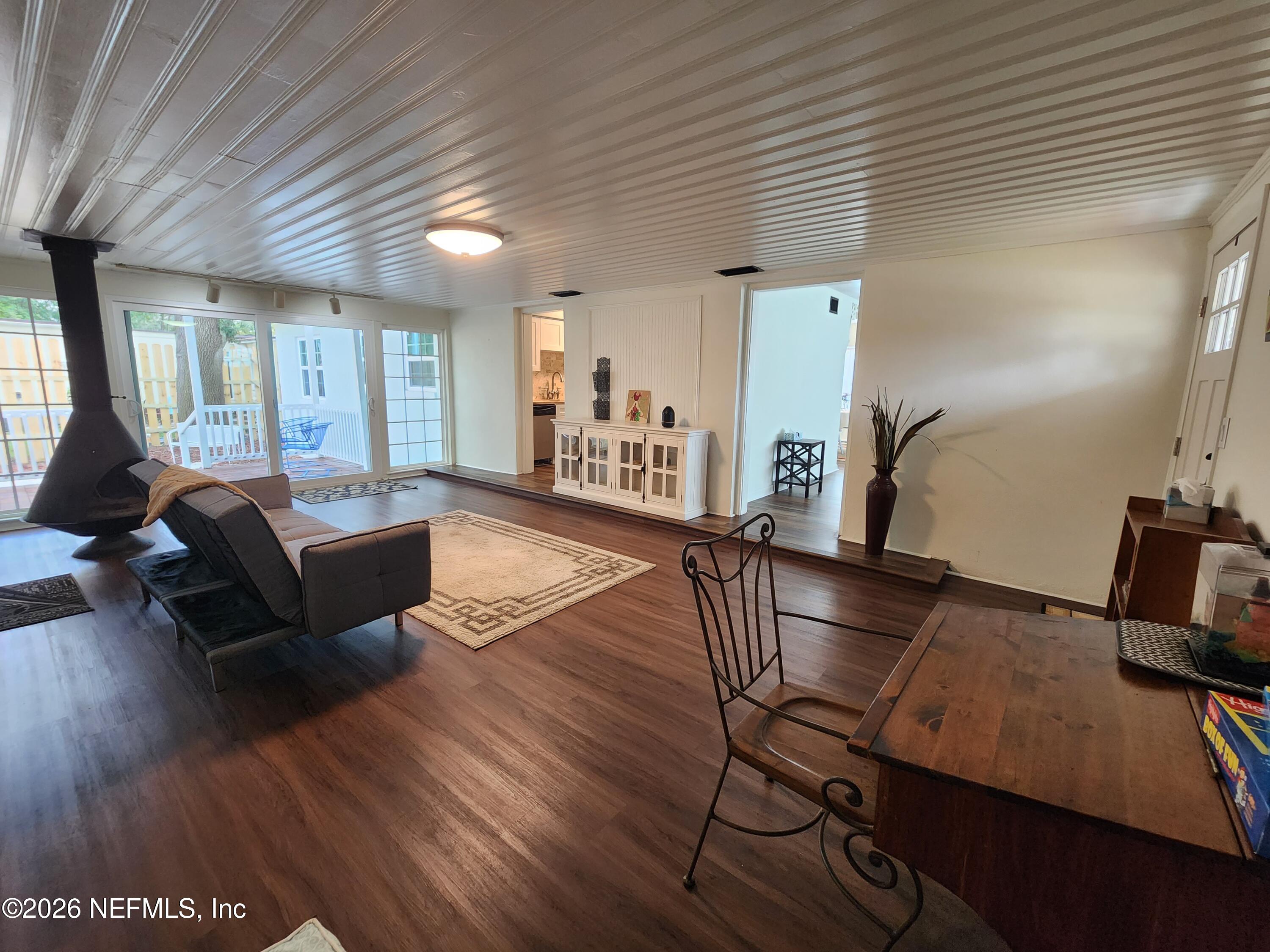 7269 Balboa Road Jacksonville, FL 32217 - Photo 6 of 24 a living room with furniture and wooden floor