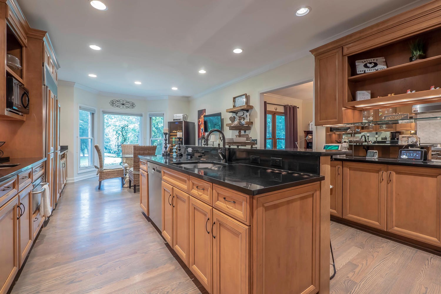 5922 Cane Ridge Road Antioch, TN 37013 - Photo 17 of 50 a open kitchen with stainless steel appliances granite countertop a stove and a sink