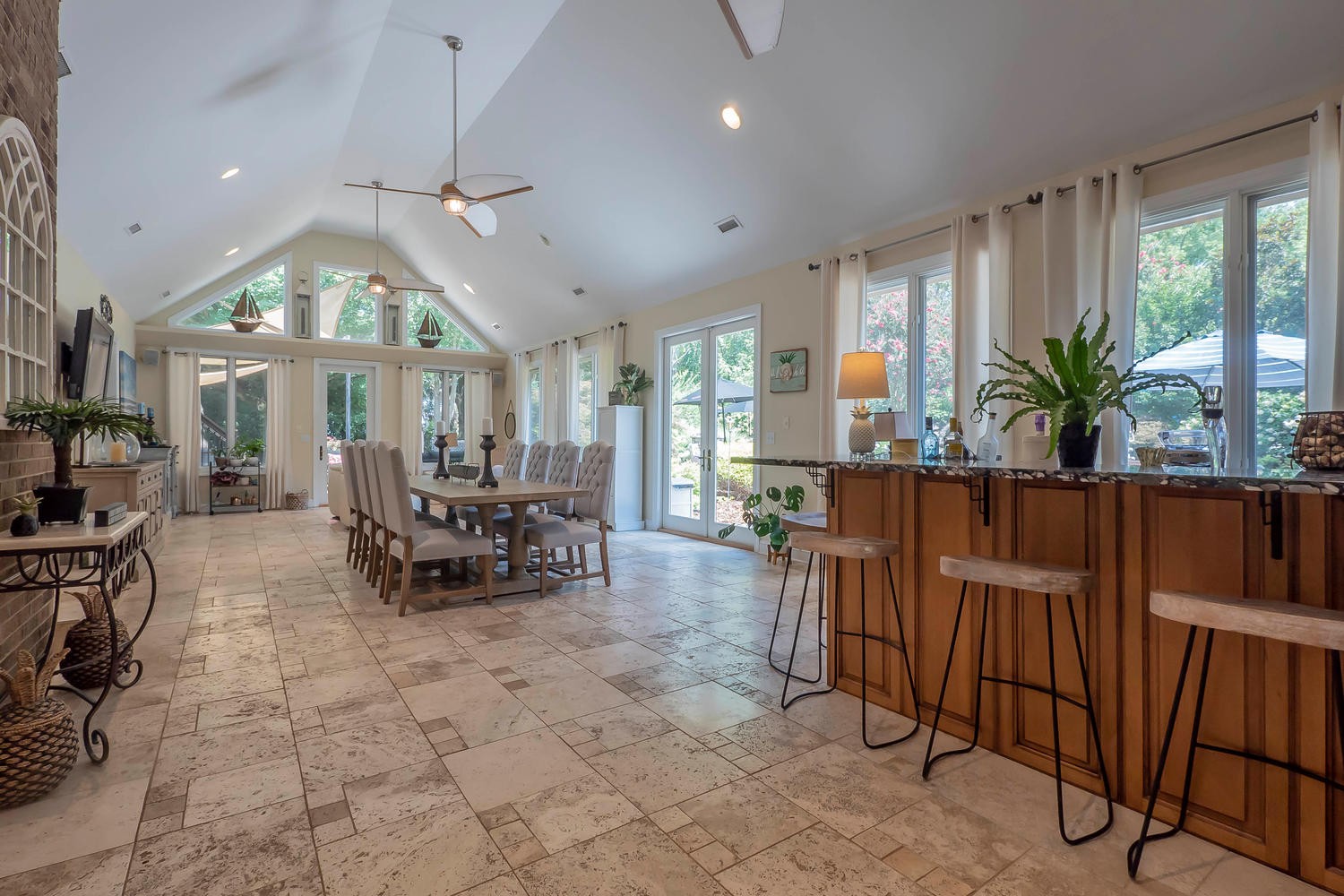 5922 Cane Ridge Road Antioch, TN 37013 - Photo 21 of 50 a living room with furniture a large window and a fireplace