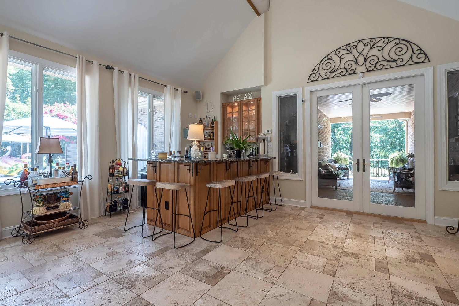 5922 Cane Ridge Road Antioch, TN 37013 - Photo 22 of 50 a room with lots of table and a large window