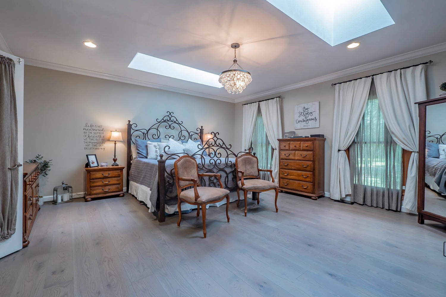 5922 Cane Ridge Road Antioch, TN 37013 - Photo 28 of 50 a bedroom with furniture window and wooden floor