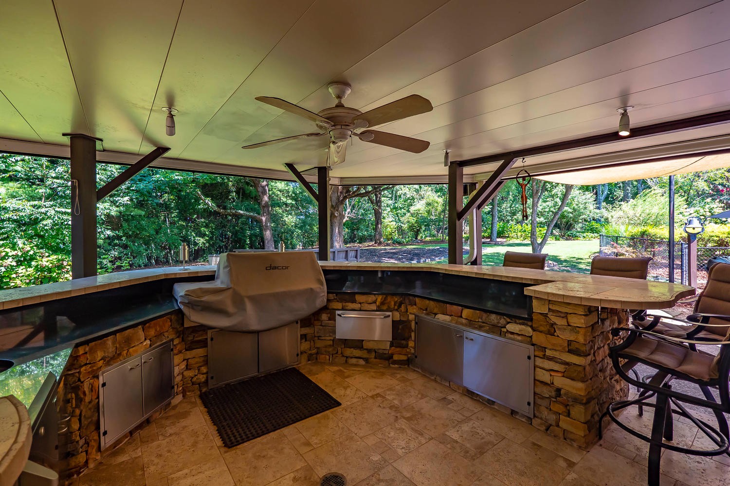 5922 Cane Ridge Road Antioch, TN 37013 - Photo 38 of 50 a kitchen with a table chairs and a barbeque
