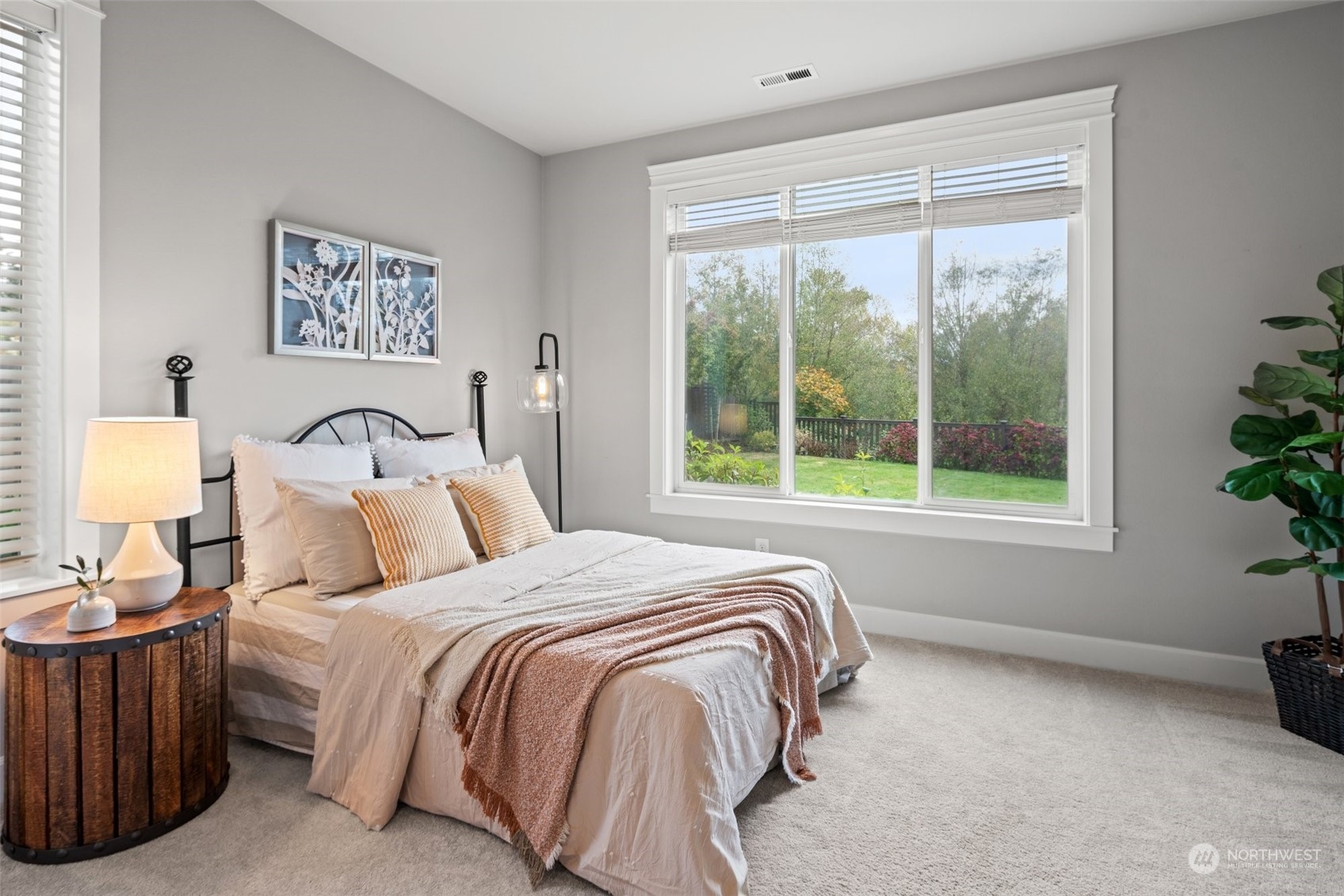 24213 1st Avenue Southeast Bothell, WA 98021 - Photo 16 of 32 a bedroom with a bed and a window