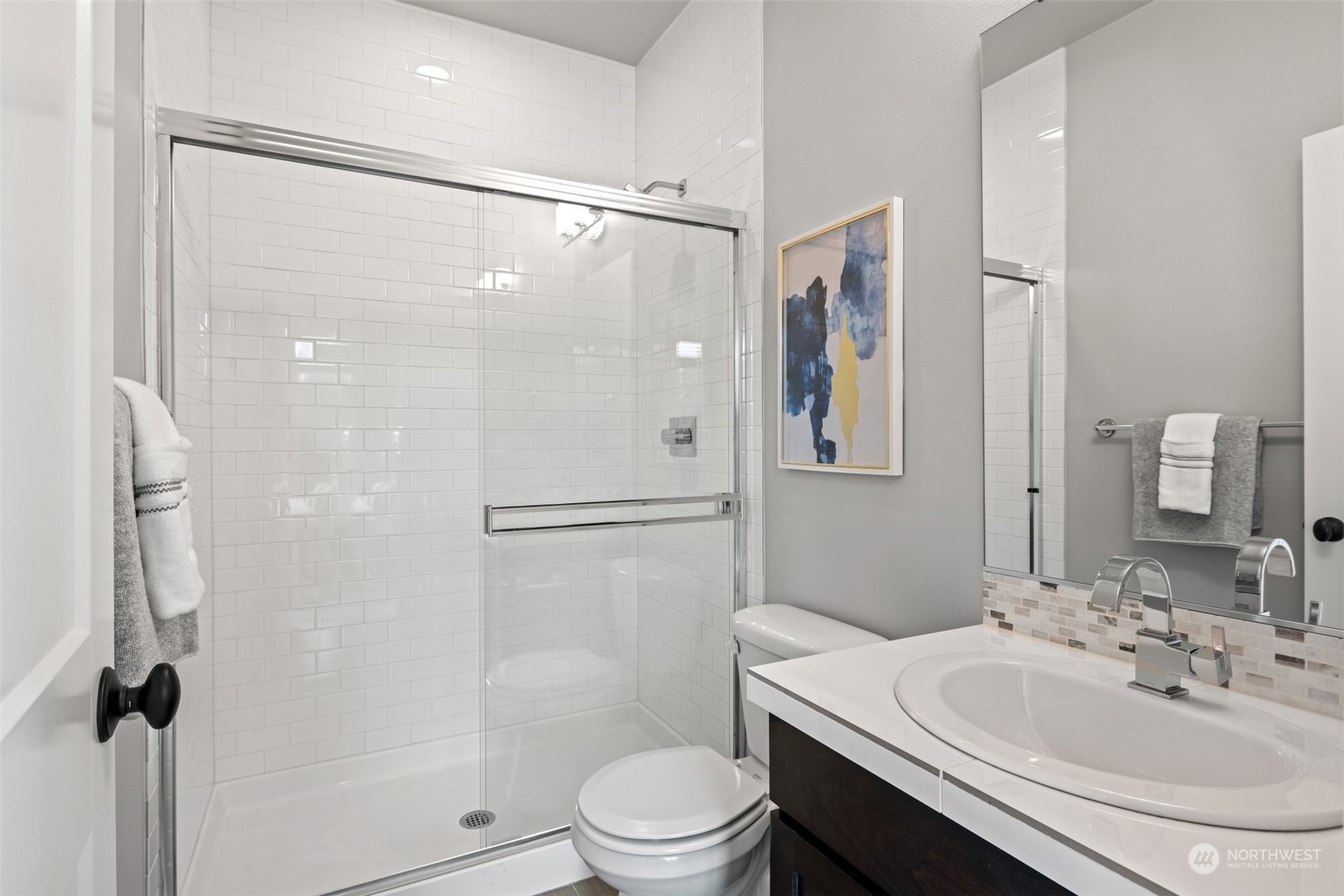 24213 1st Avenue Southeast Bothell, WA 98021 - Photo 17 of 32 a bathroom with a sink toilet and shower