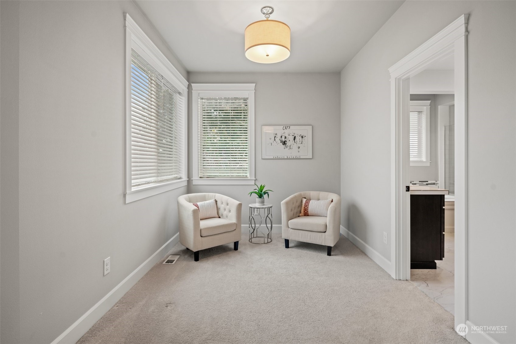 24213 1st Avenue Southeast Bothell, WA 98021 - Photo 21 of 32 a living room with furniture and a window
