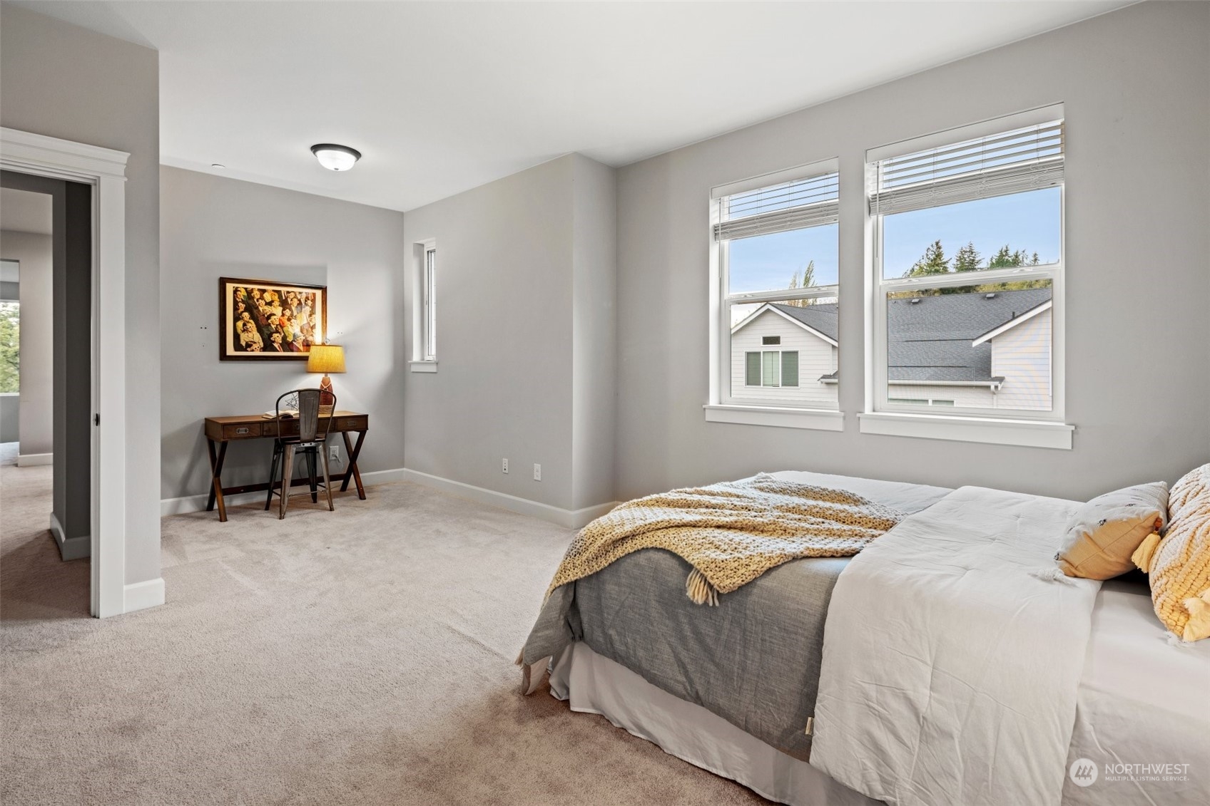 24213 1st Avenue Southeast Bothell, WA 98021 - Photo 23 of 32 a bedroom with a bed and a window
