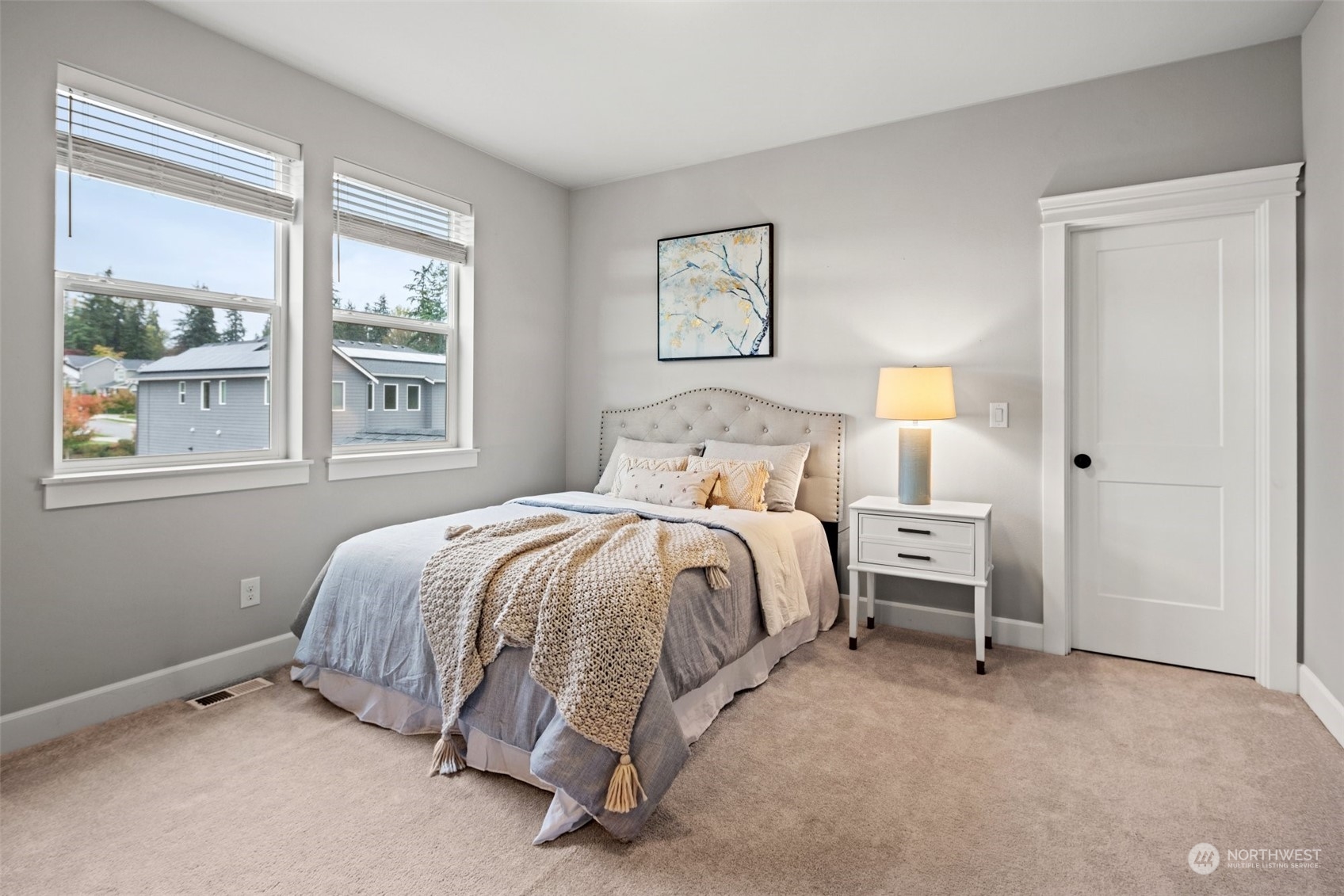 24213 1st Avenue Southeast Bothell, WA 98021 - Photo 24 of 32 a spacious bedroom with a bed and a window