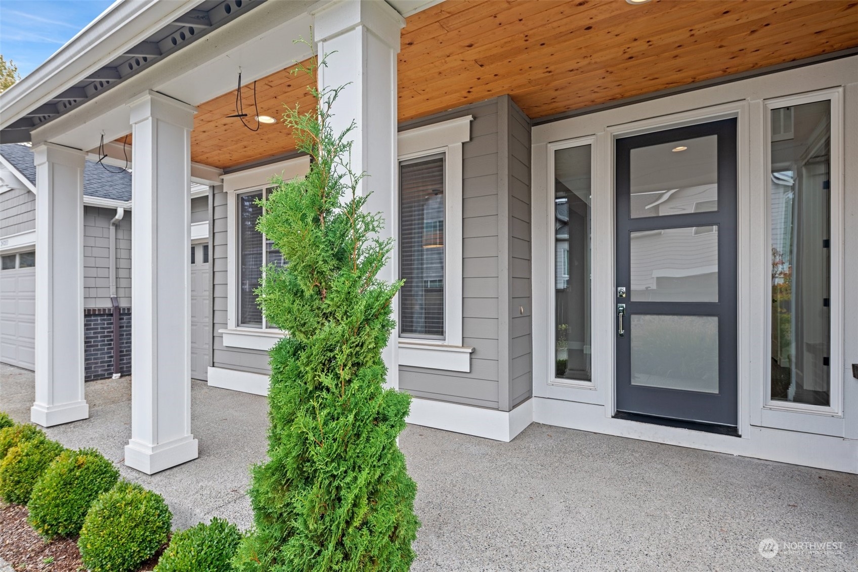 24213 1st Avenue Southeast Bothell, WA 98021 - Photo 30 of 32 front view of a house with a glass door