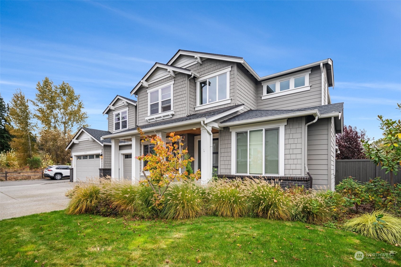 24213 1st Avenue Southeast Bothell, WA 98021 - Photo 32 of 32 a front view of a house with garden