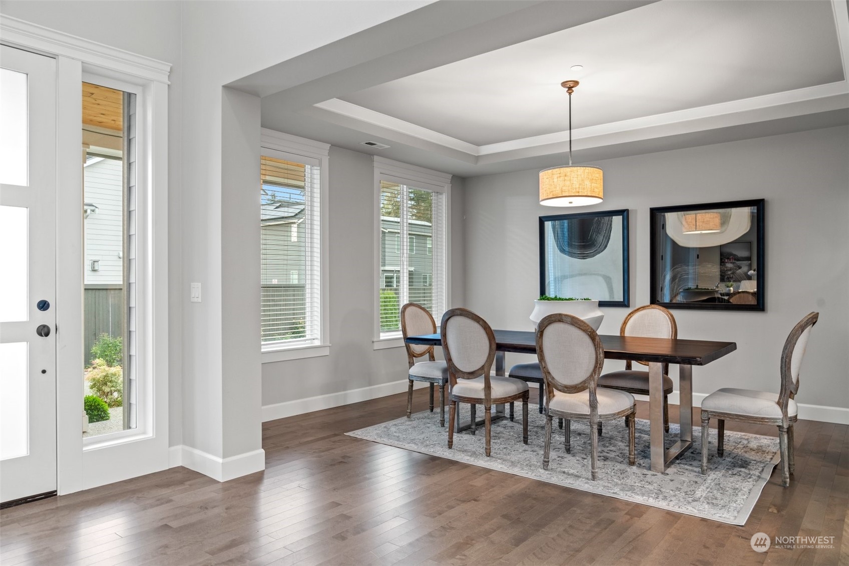 24213 1st Avenue Southeast Bothell, WA 98021 - Photo 4 of 32 a view of a dining room with furniture window and wooden floor