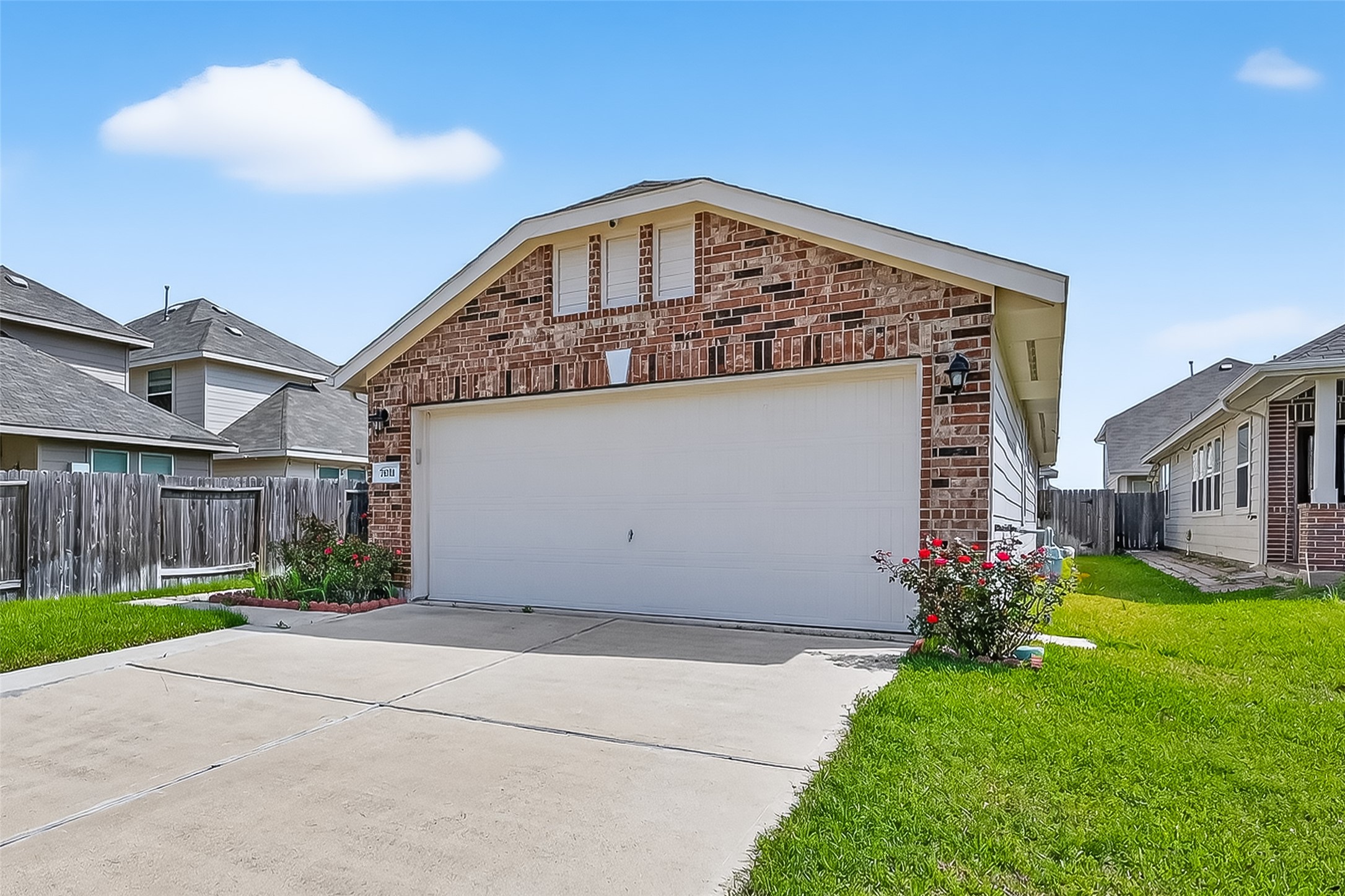 7631 Granite Terrace Lane Houston, TX 77083 - Photo 2 of 46 a front view of a house with garden