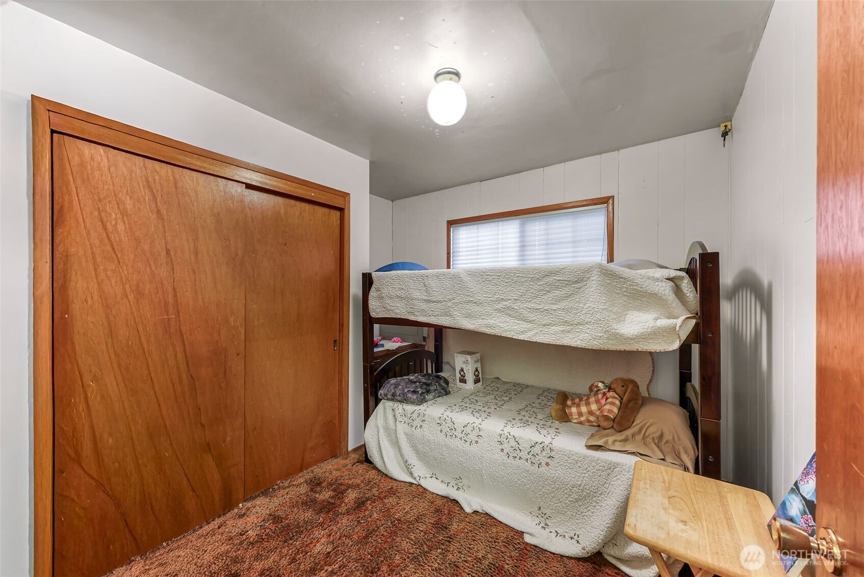 8634 Double Ditch Road Lynden, WA 98264 - Photo 11 of 40 a bedroom with a bed and a window